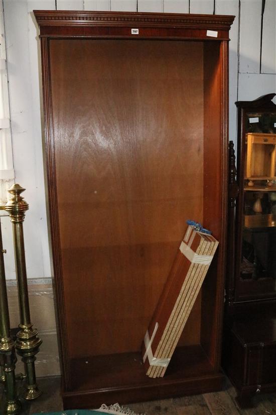 Tall mahogany open bookcase